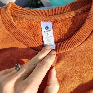 Long sleeved orange sweatshirt